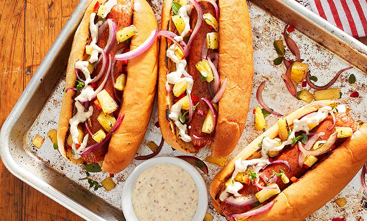 plant-based sausages in hot dog buns